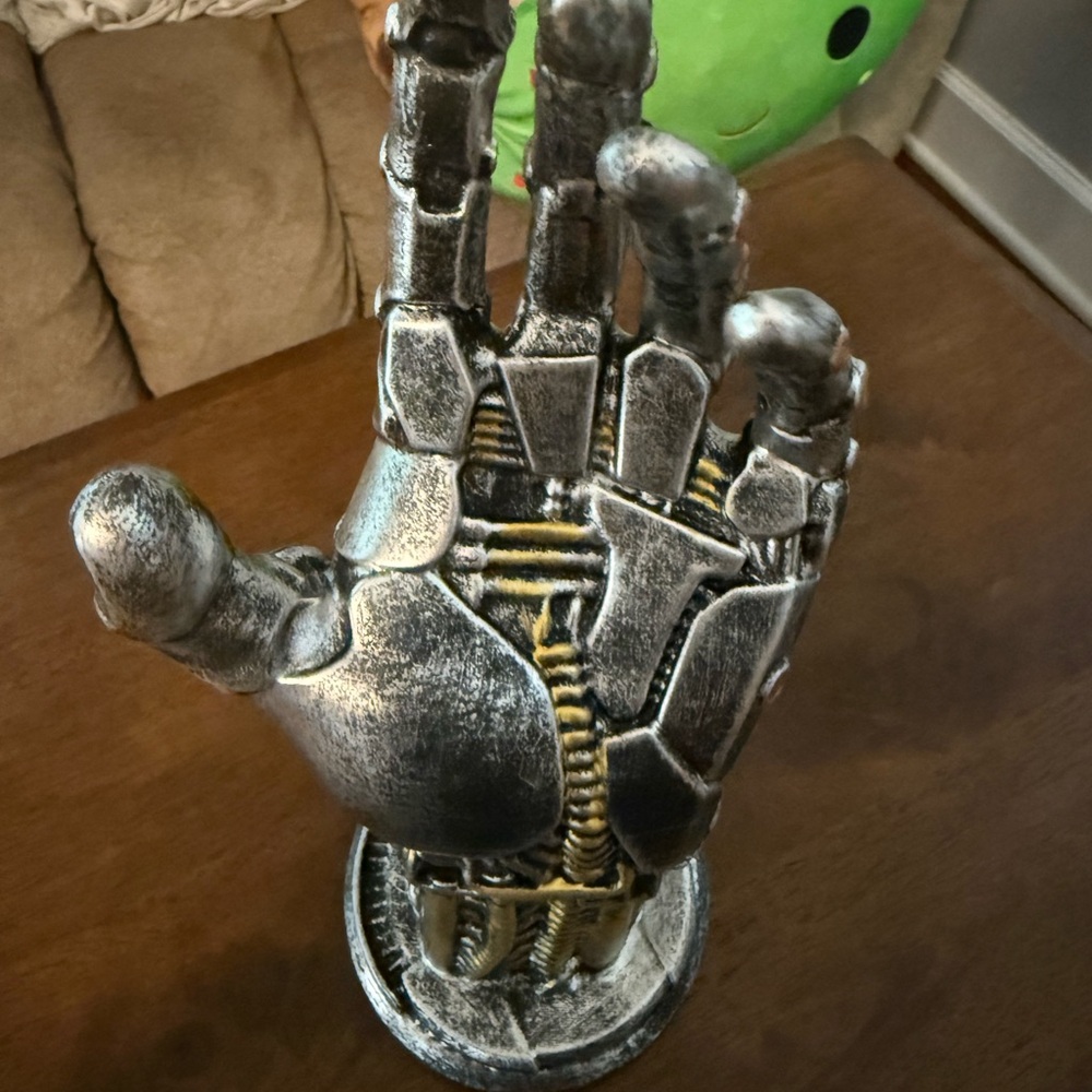 Silver Robotic Hand Sculpture Art